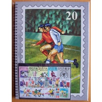 FIFA WORLD CUP STAMP ALBUM/STOCKBOOK WITH 50 SOCCER STAMPS - GREY 
